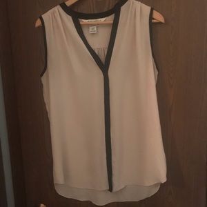 Tan with black lining sheer long shell tank.